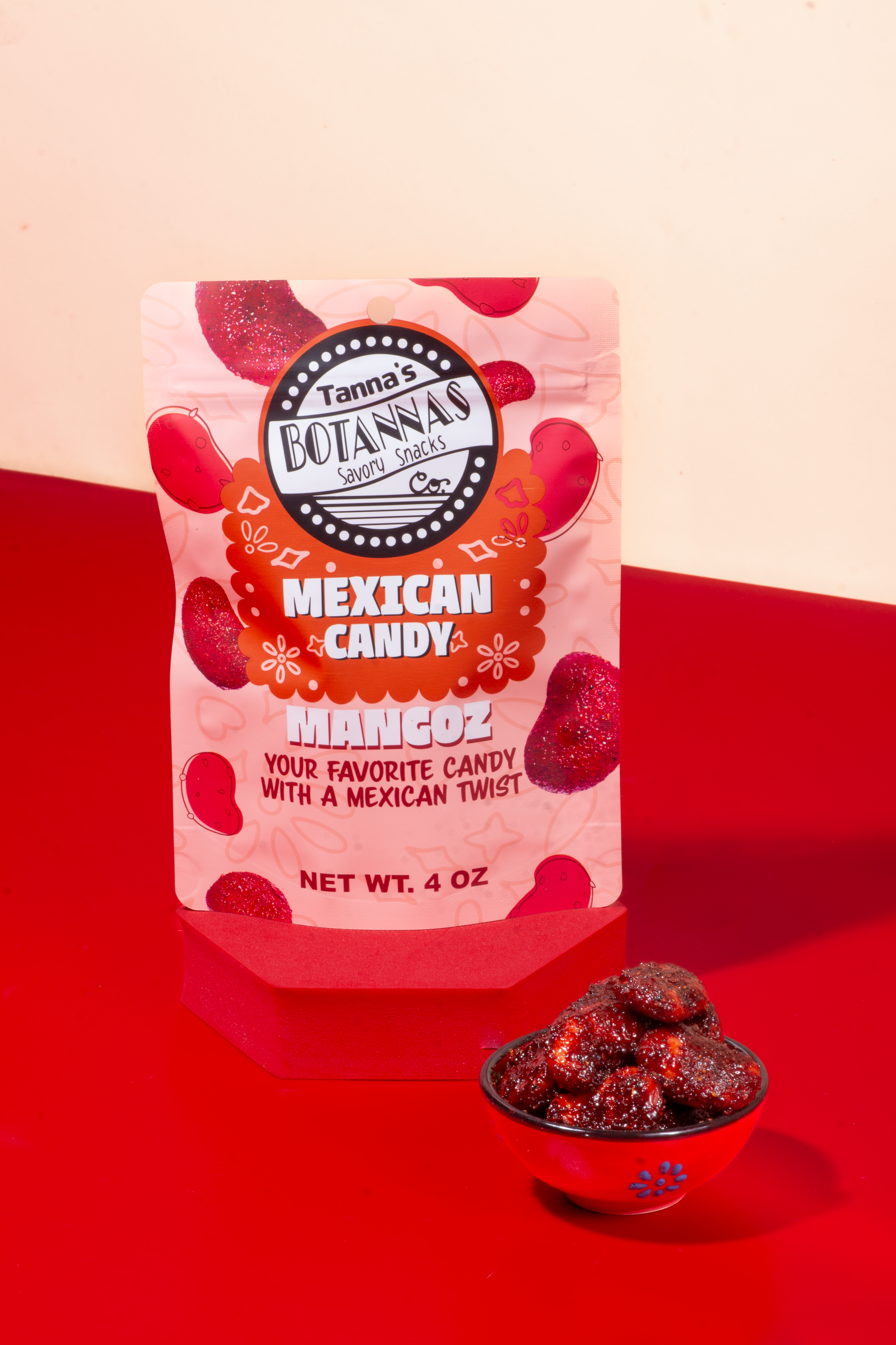 Packaged candy with Botanas branding on a red background